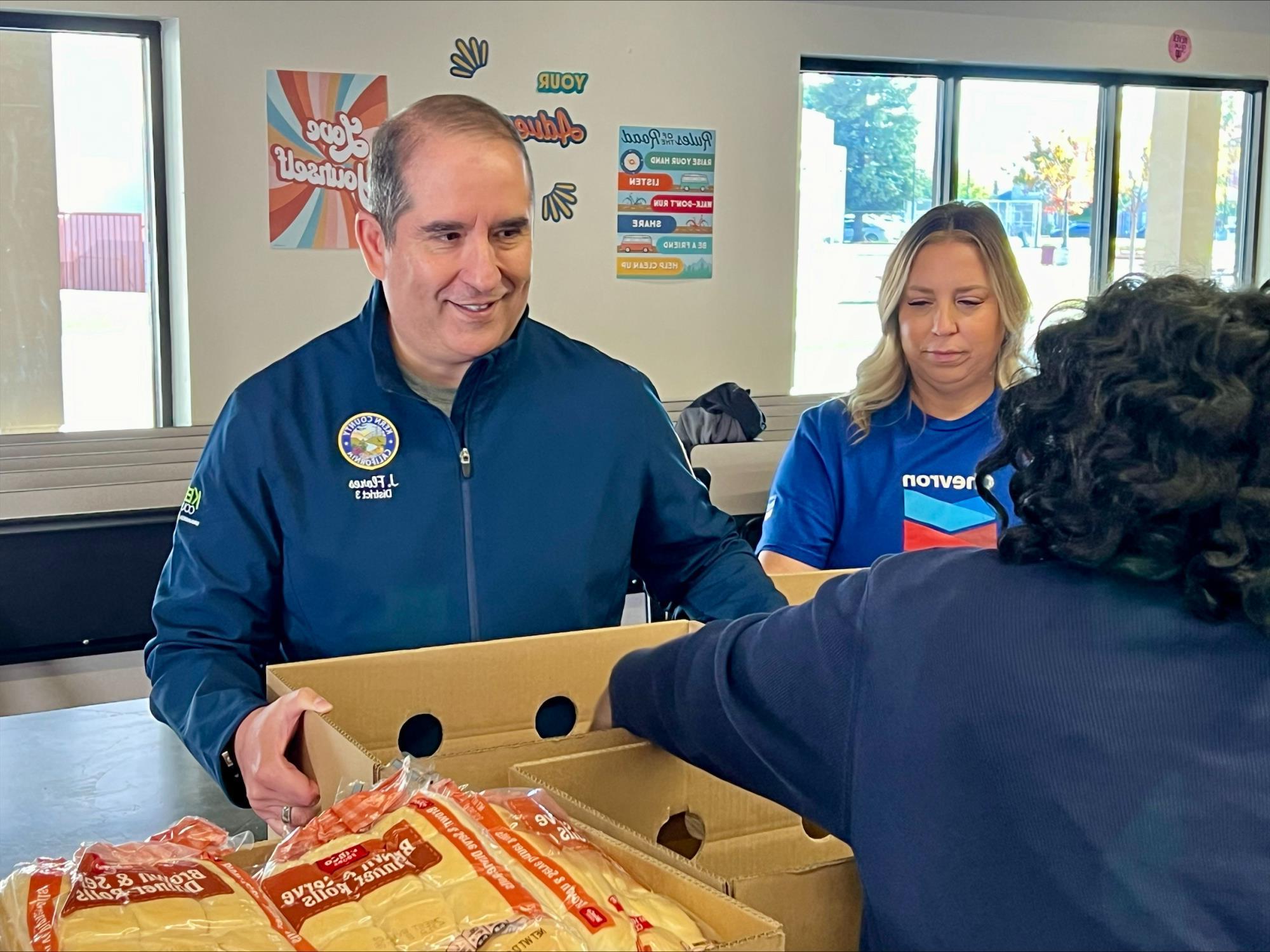 Serving at the Thanksgiving Basket Project at Standard Middle School, along with partners at Chevron and Bakersfield North Rotary.